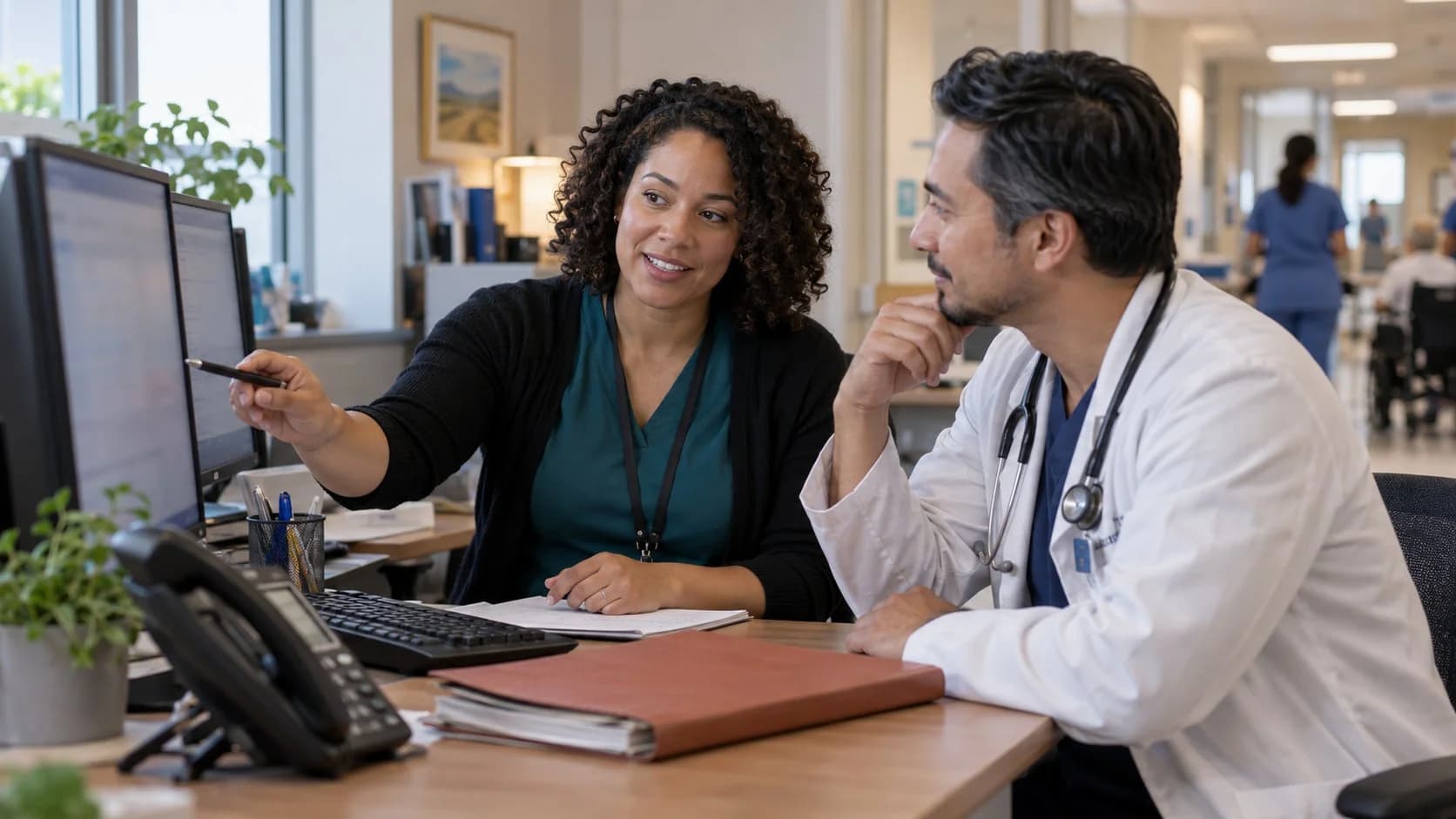 Medical coder and clinician resolving a claim detail together