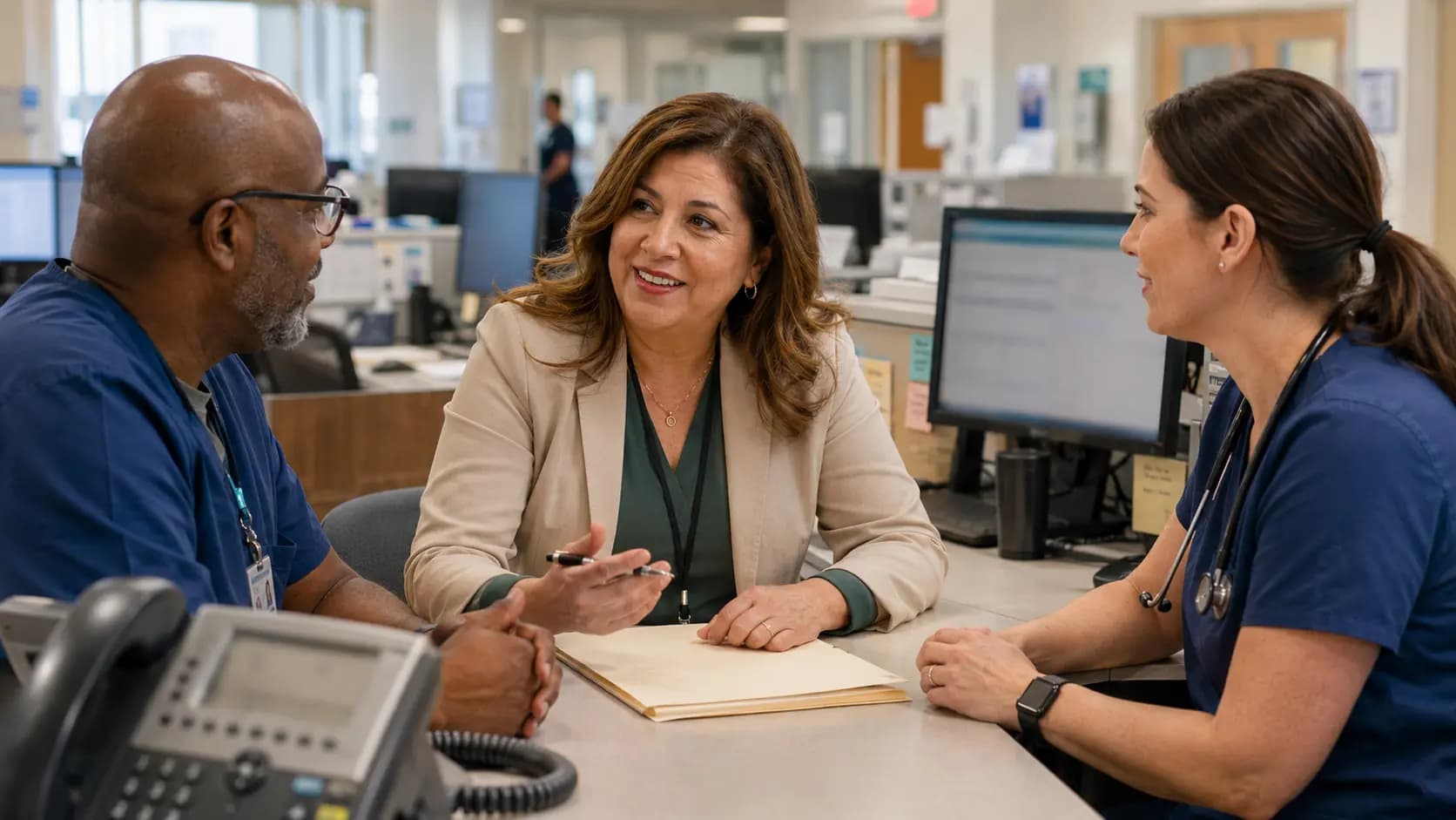 Revenue-cycle specialist and clinician resolving a billing workflow together