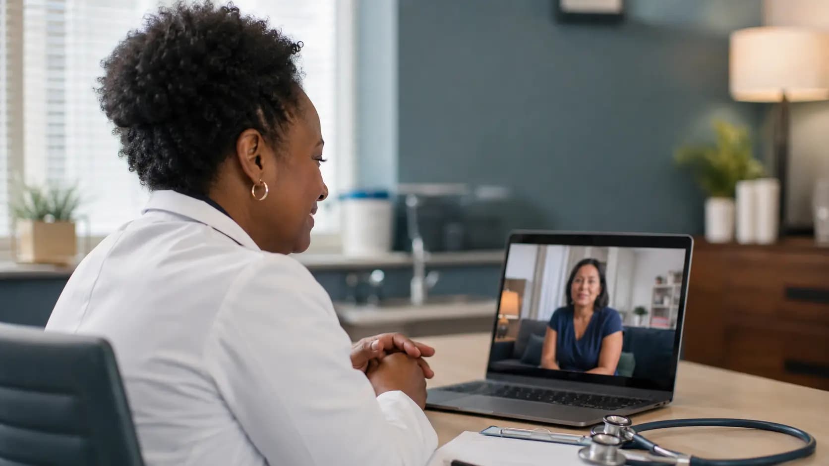 Clinician and patient sharing a warm moment during a telehealth visit