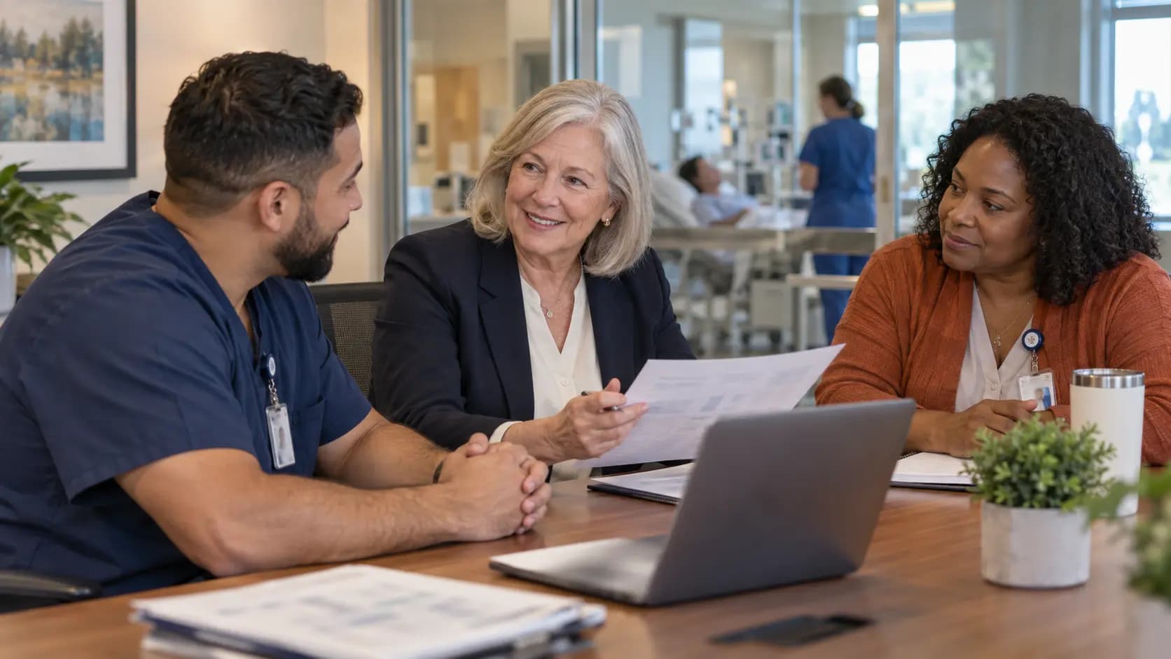 Healthcare finance and operations leaders discussing a practical next step Healthcare finance and operations leaders discussing a practical next step