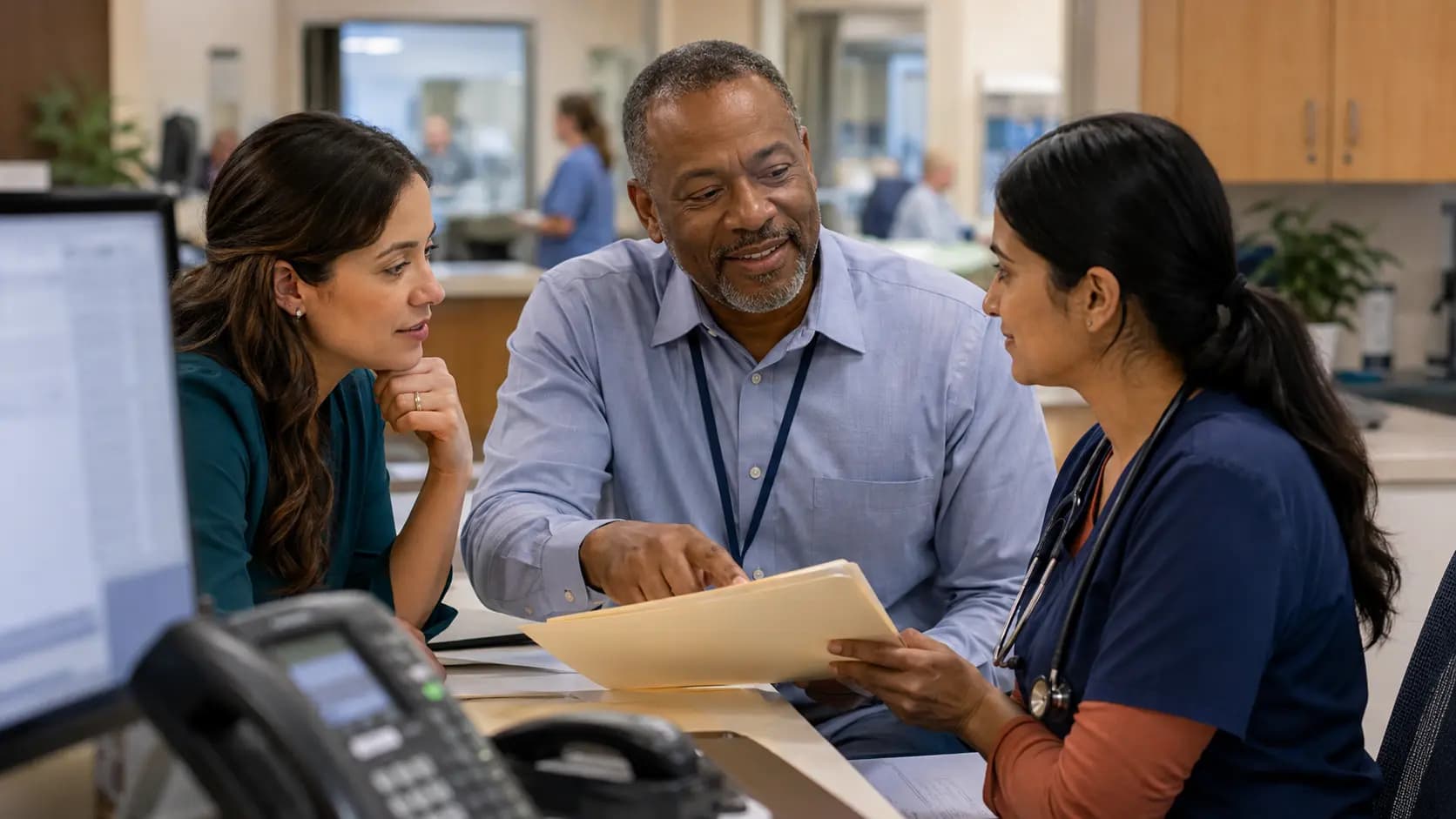 Revenue-cycle specialist and clinician resolving a billing workflow together