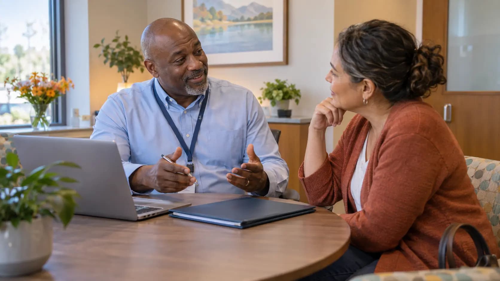 Patient financial counselor having a respectful conversation with a patient Patient financial counselor having a respectful conversation with a patient