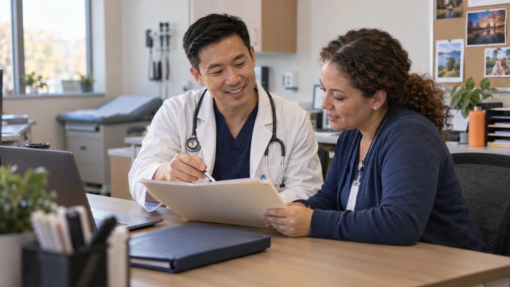 Medical coder and clinician discussing documentation in a medical office