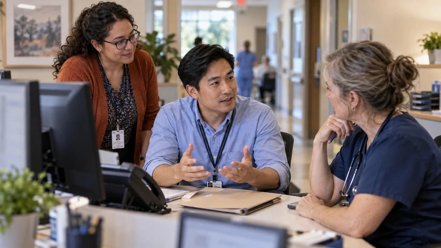 Patient-access coordinator and clinician resolving an authorization issue