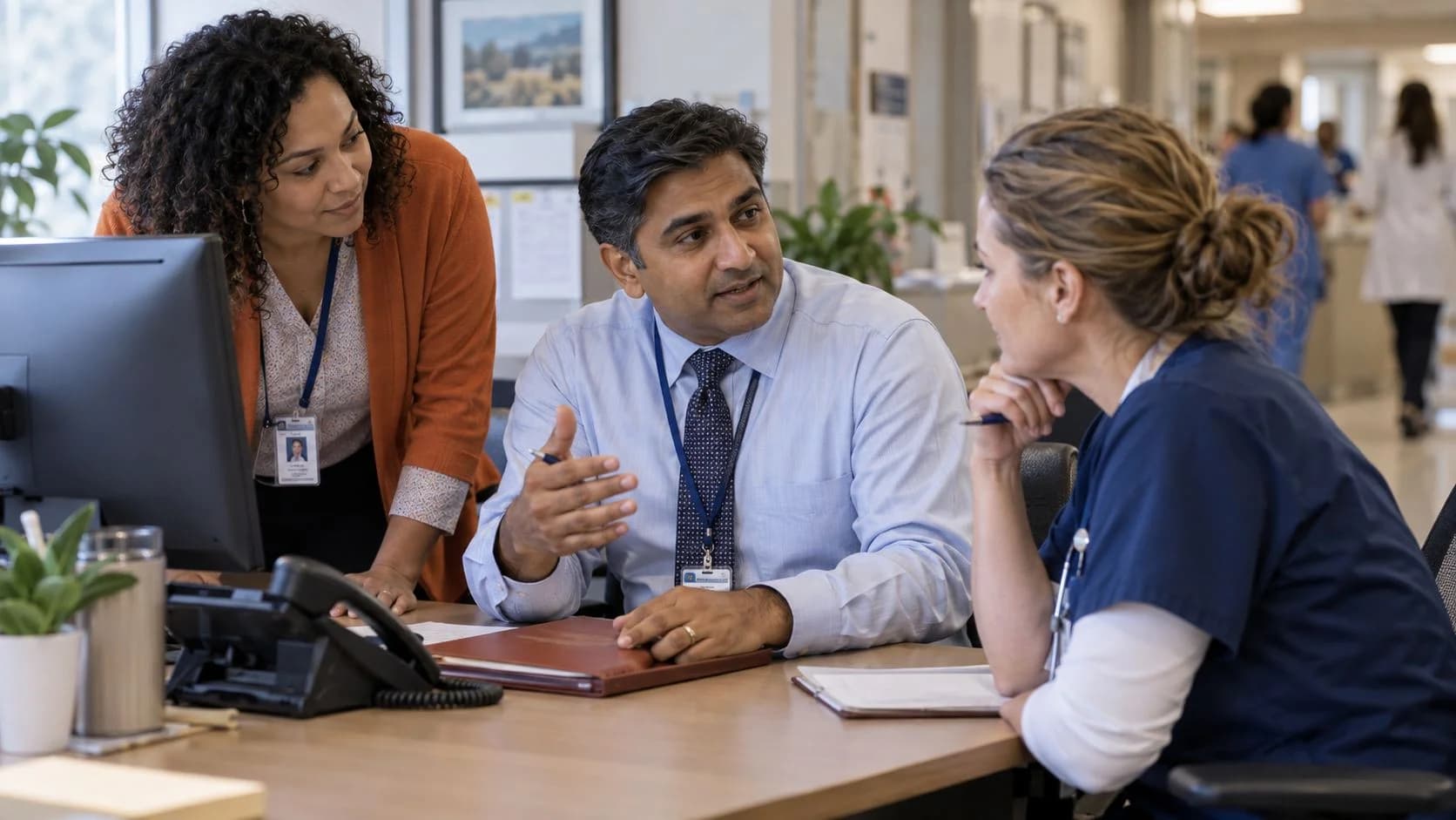 Patient-access coordinator and clinician resolving an authorization issue