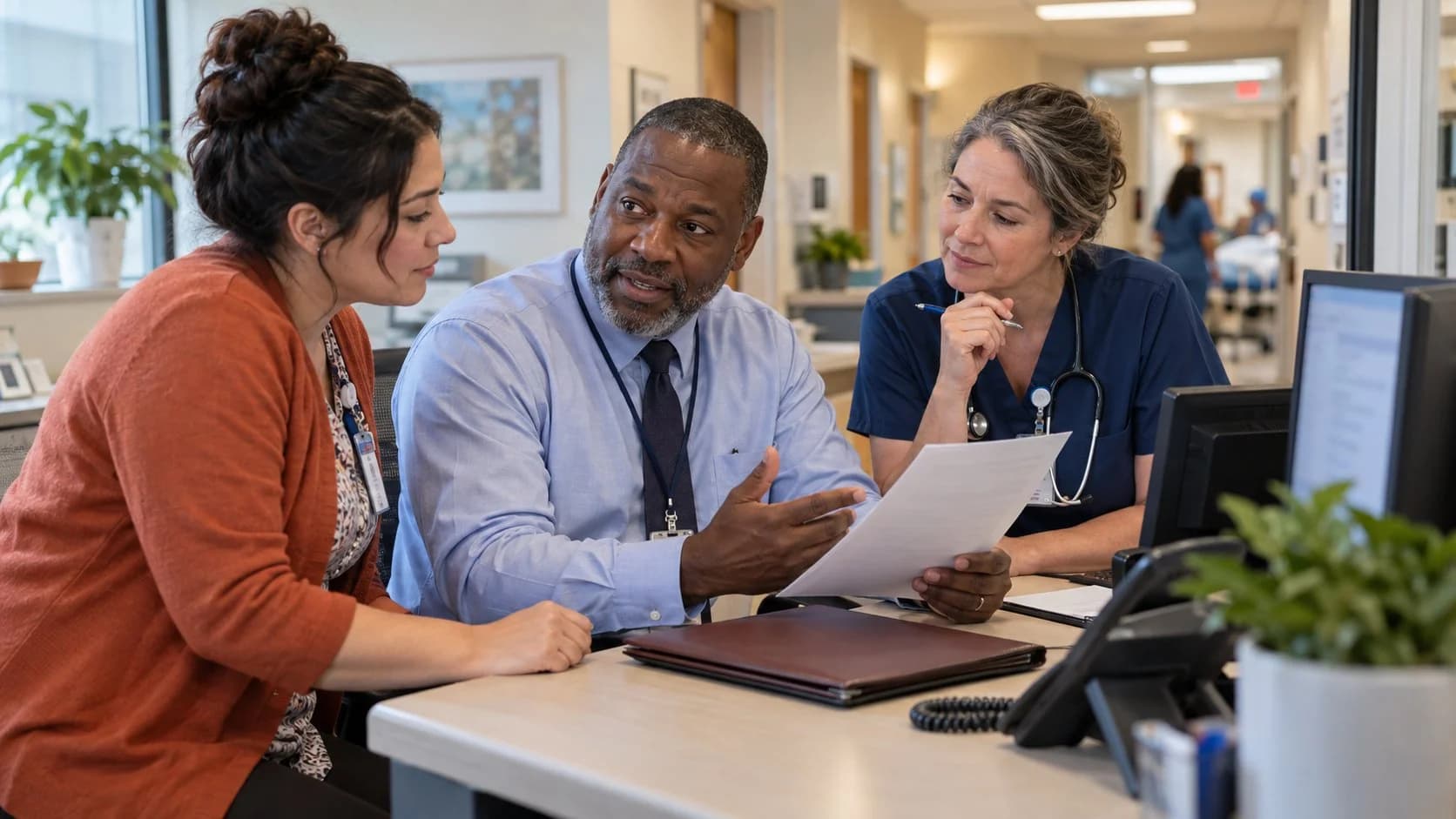 Patient-access coordinator and clinician resolving an authorization issue