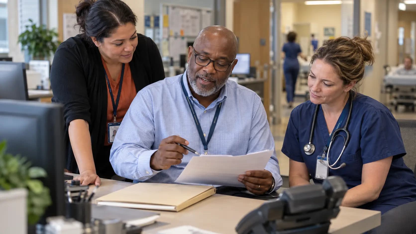 Revenue-cycle specialist and clinician resolving a billing workflow together