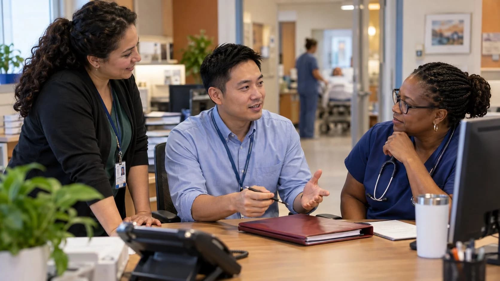 Patient-access coordinator and clinician resolving an authorization issue