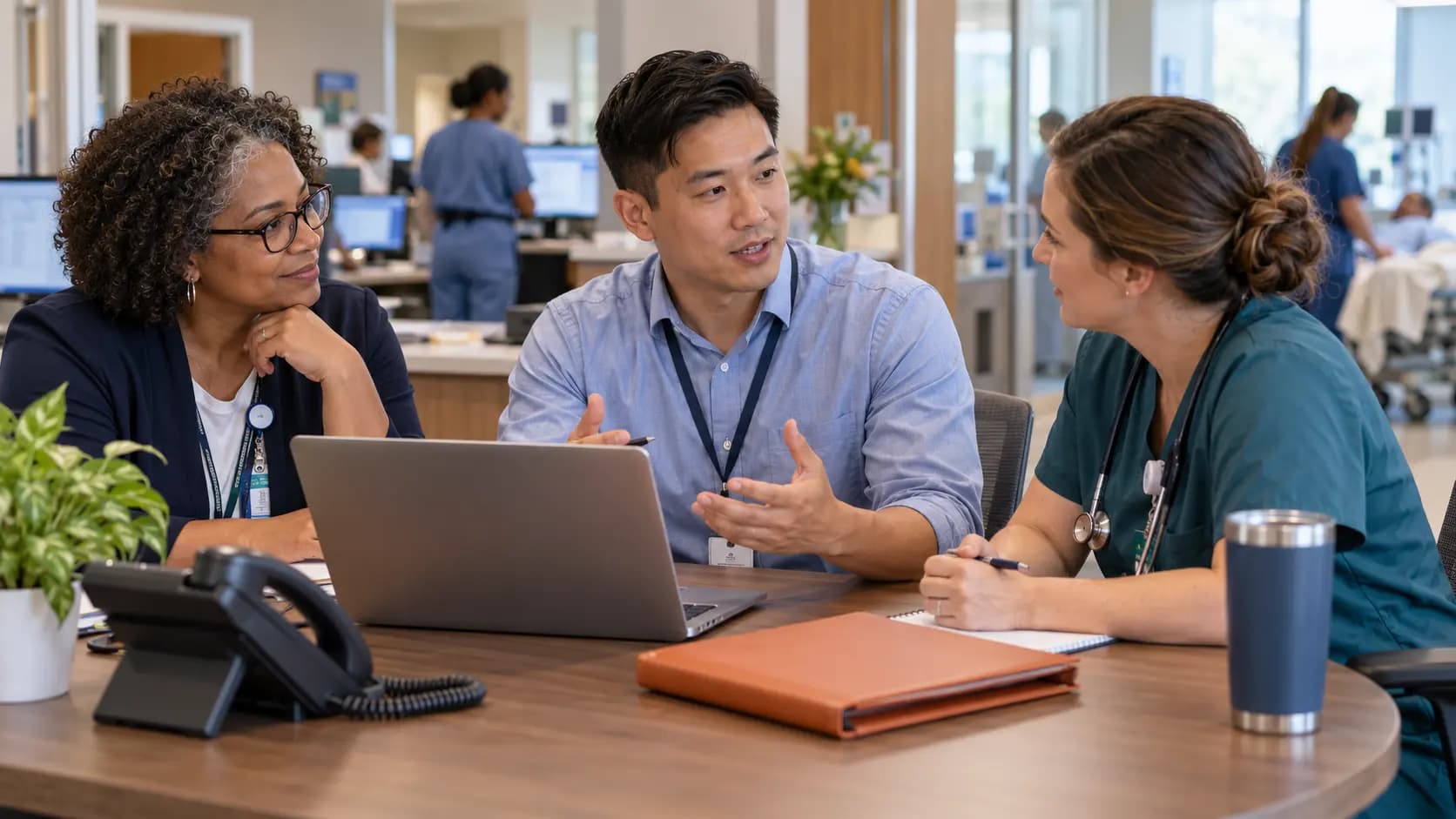 Revenue-cycle specialist and clinician resolving a billing workflow together Revenue-cycle specialist and clinician resolving a billing workflow together