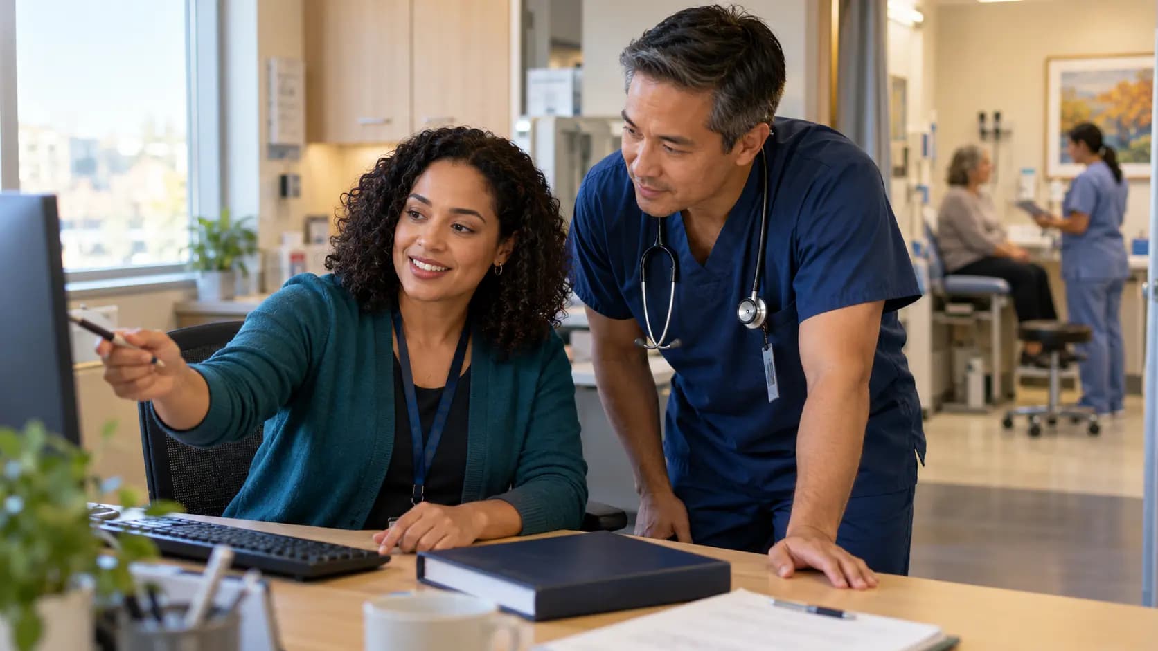 Medical coder and clinician resolving documentation together Medical coder and clinician resolving documentation together