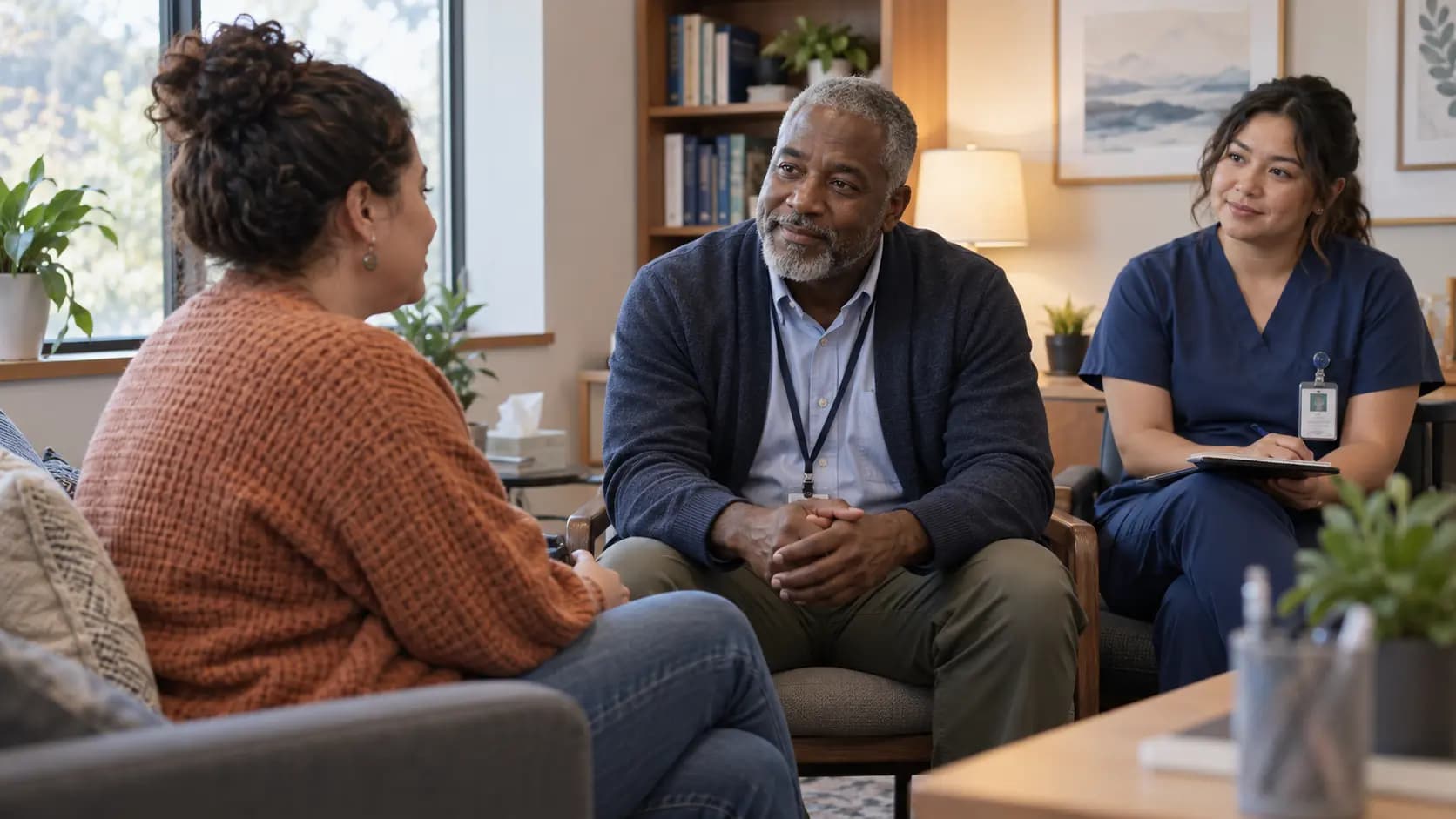 Behavioral Health clinician and patient sharing a warm, attentive moment in a clinic