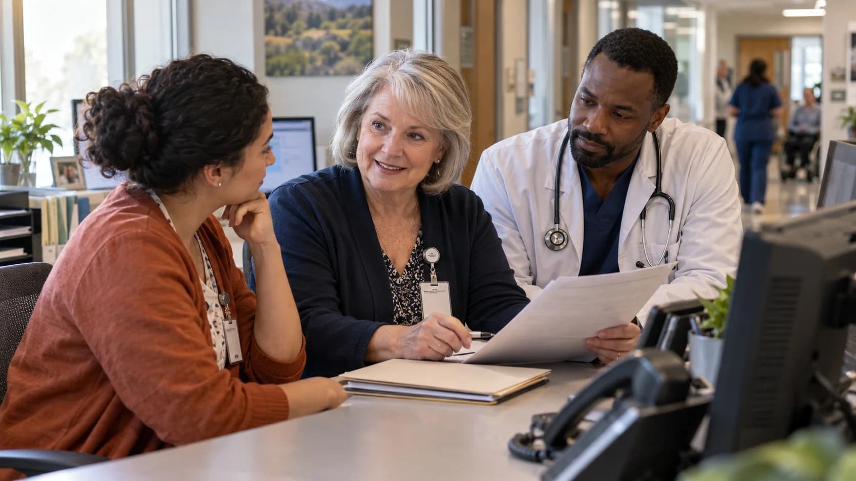 Patient-access coordinator and clinician resolving an authorization issue