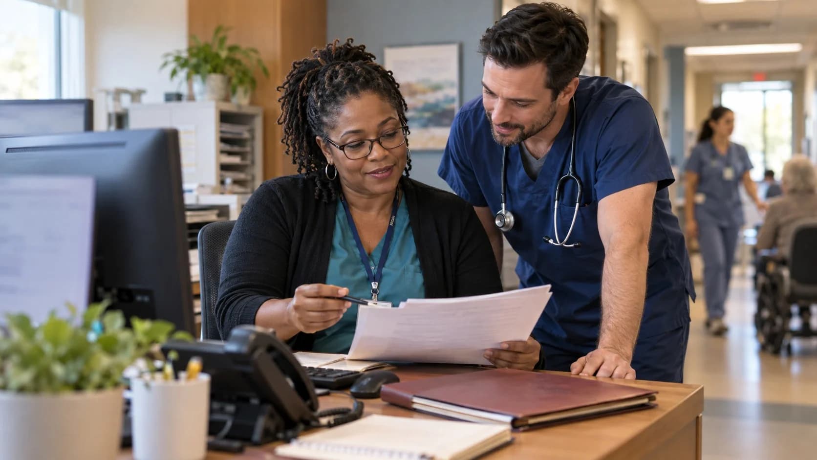 Medical coder and clinician resolving a claim detail together