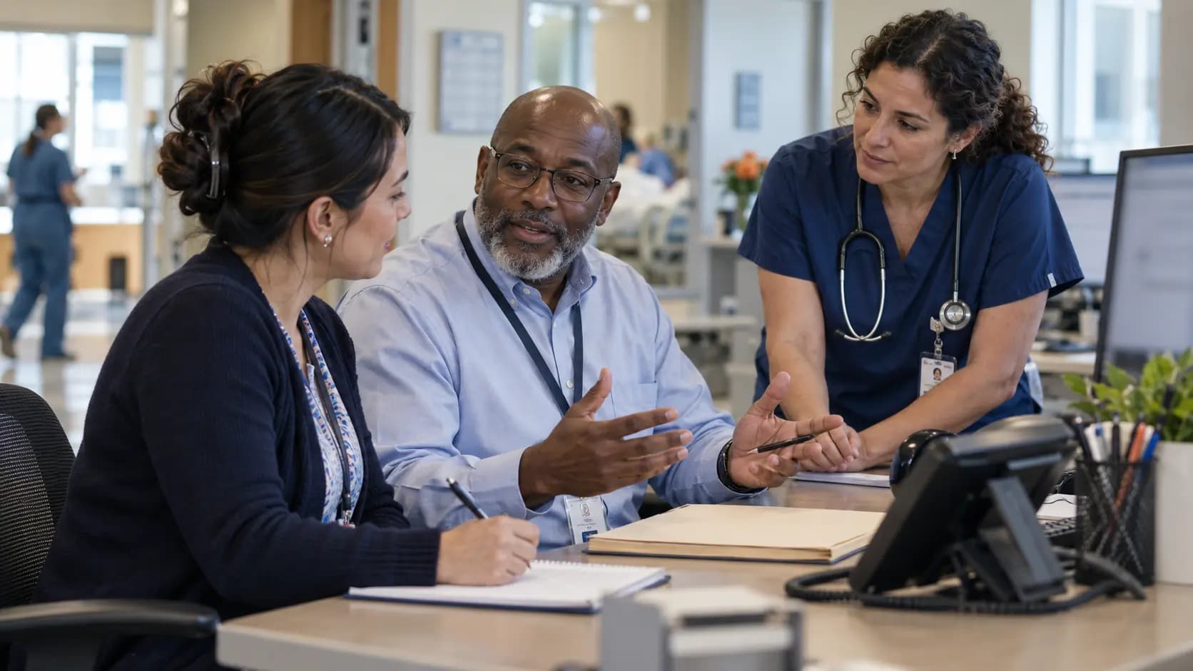 Revenue-cycle specialist and clinician resolving a billing workflow together