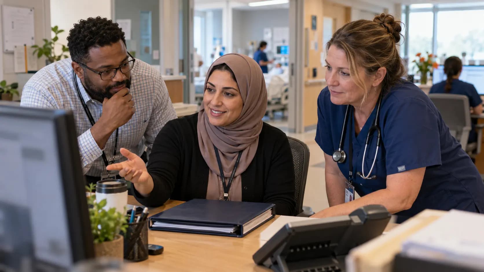 Revenue-cycle specialist and clinician resolving a billing workflow together