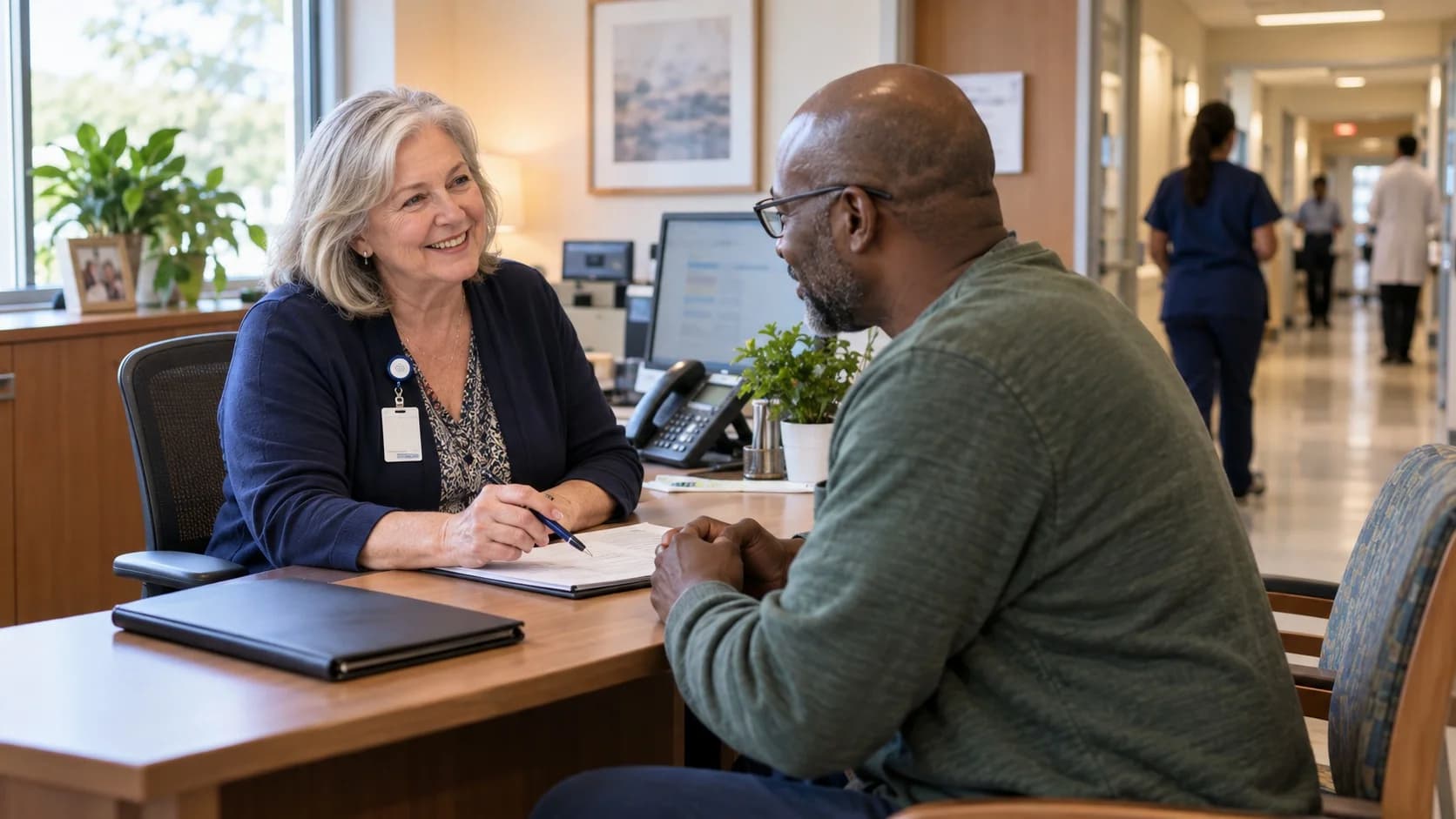 Patient financial counselor explaining a billing responsibility to a patient