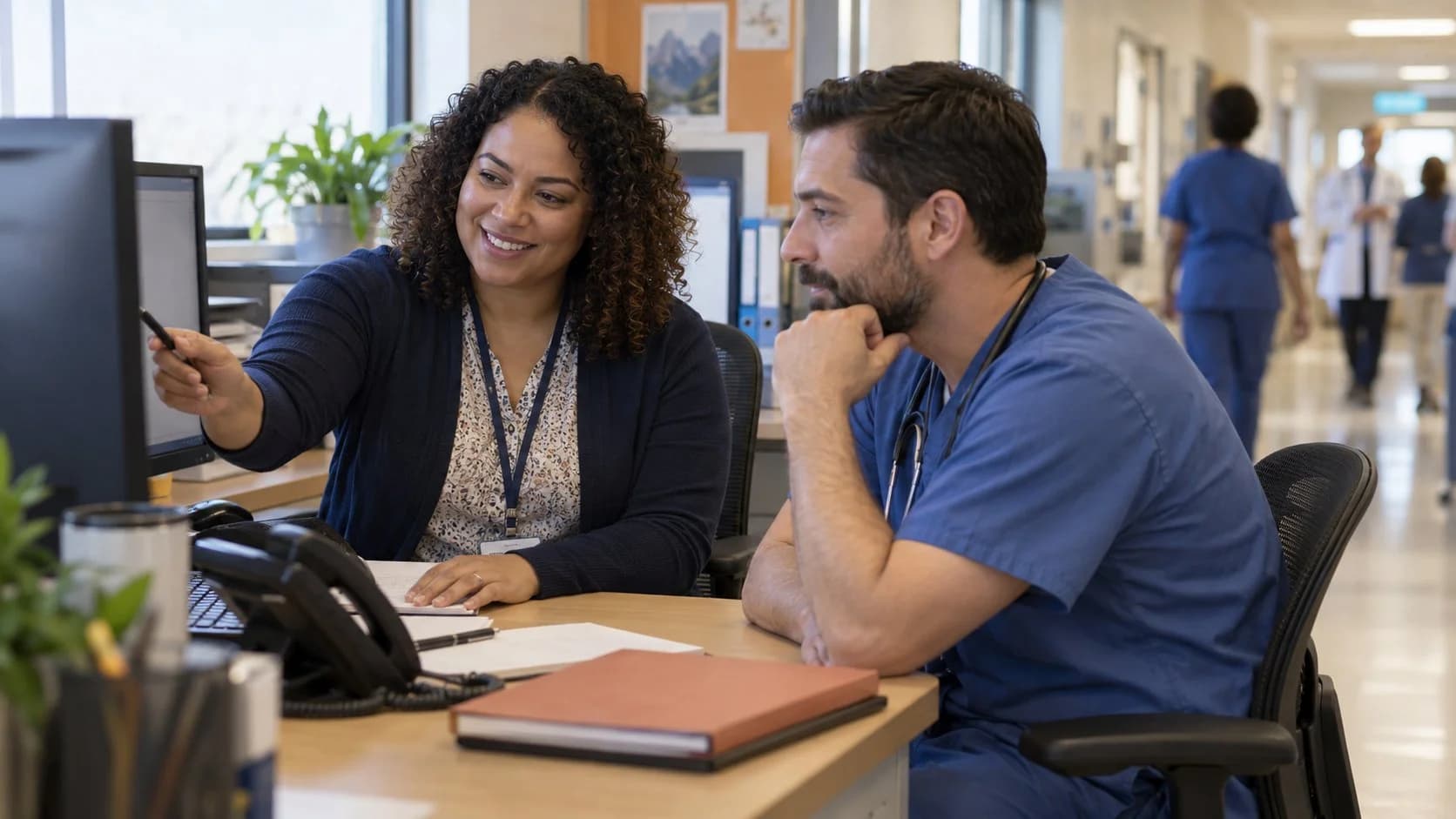 Medical coder and clinician resolving a claim detail together
