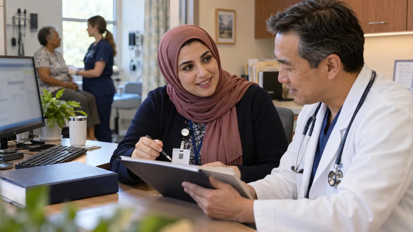Medical coder and clinician resolving documentation together