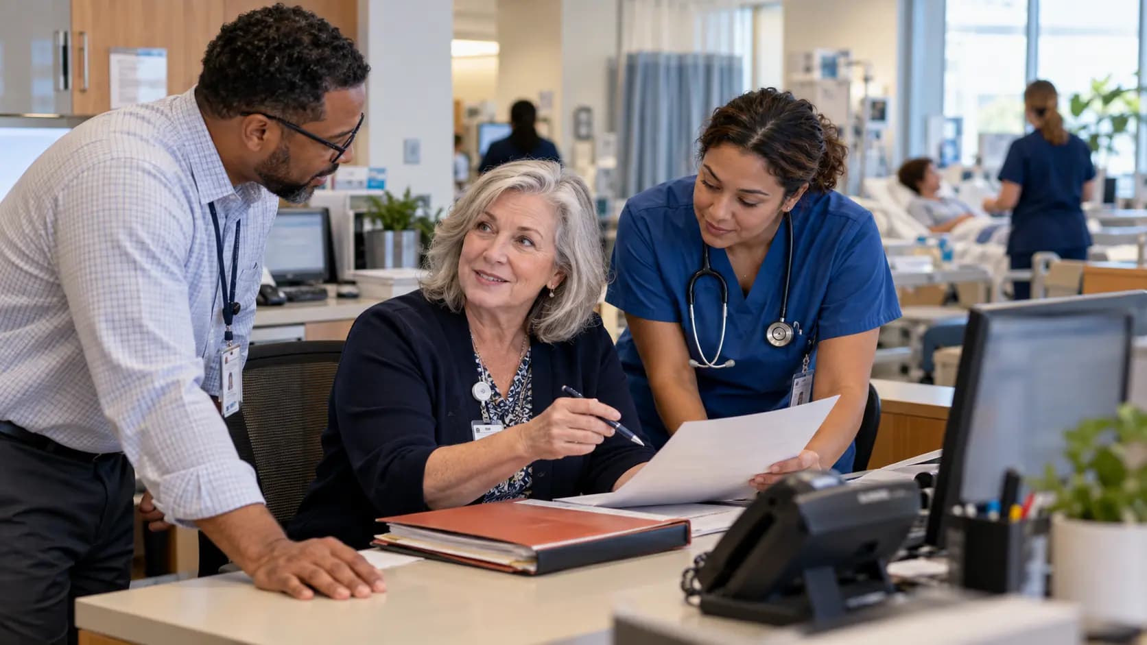 Revenue-cycle specialist and clinician resolving a billing workflow together Revenue-cycle specialist and clinician resolving a billing workflow together