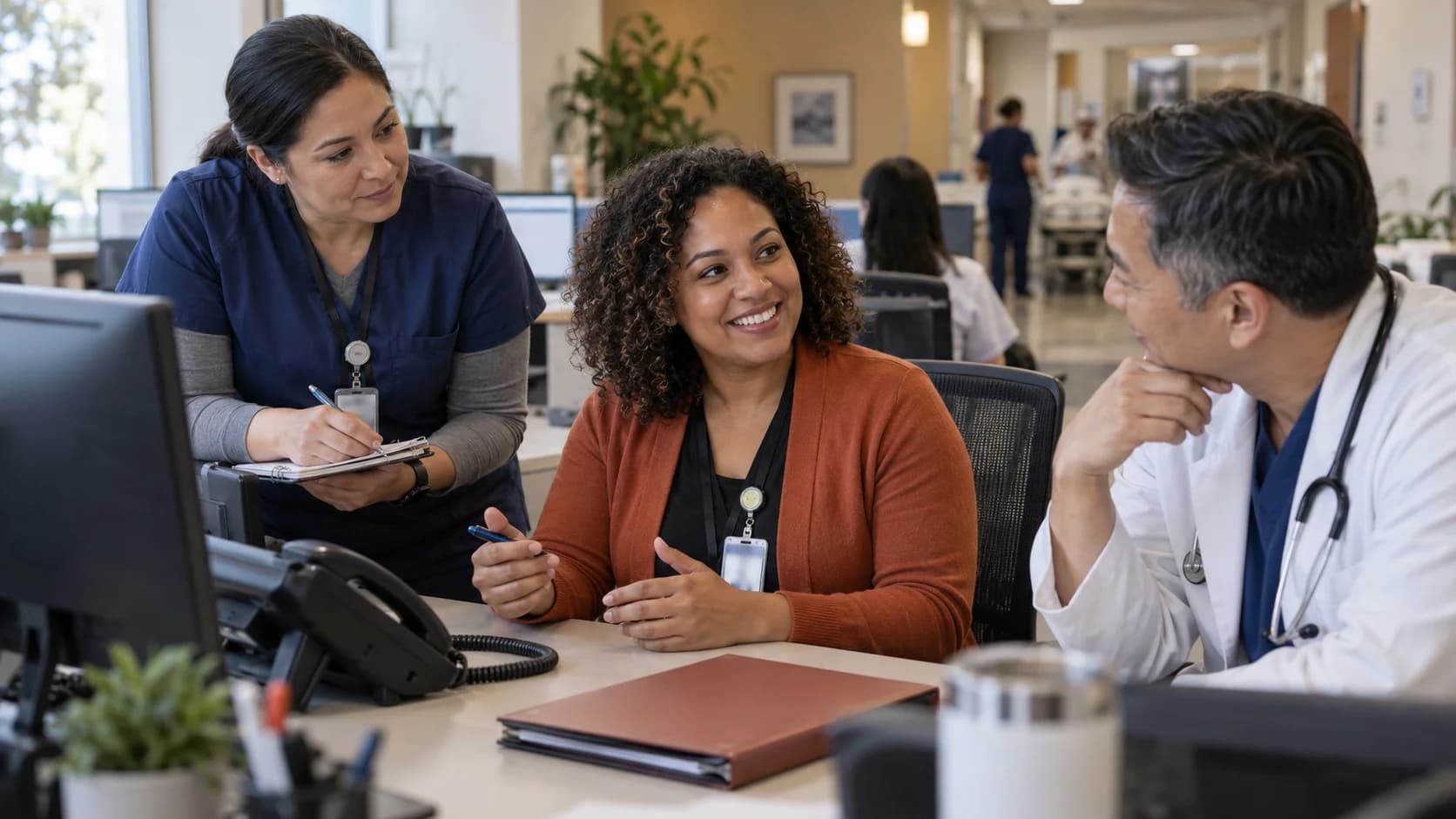 Patient-access coordinator and clinician resolving an authorization issue