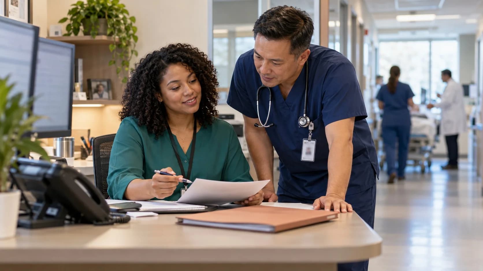 Medical coder and clinician resolving a claim detail together