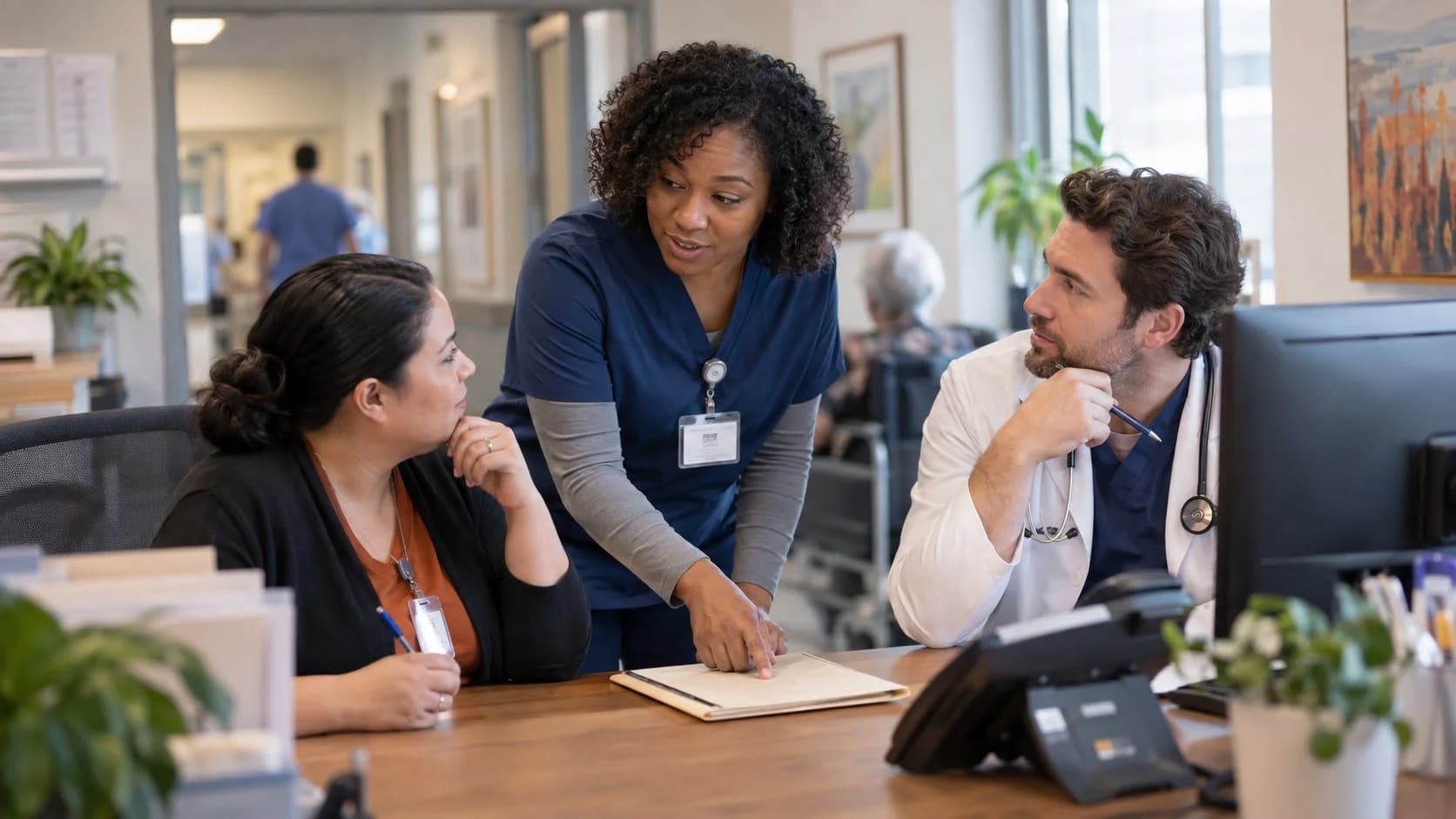 Patient-access coordinator and clinician resolving an authorization issue