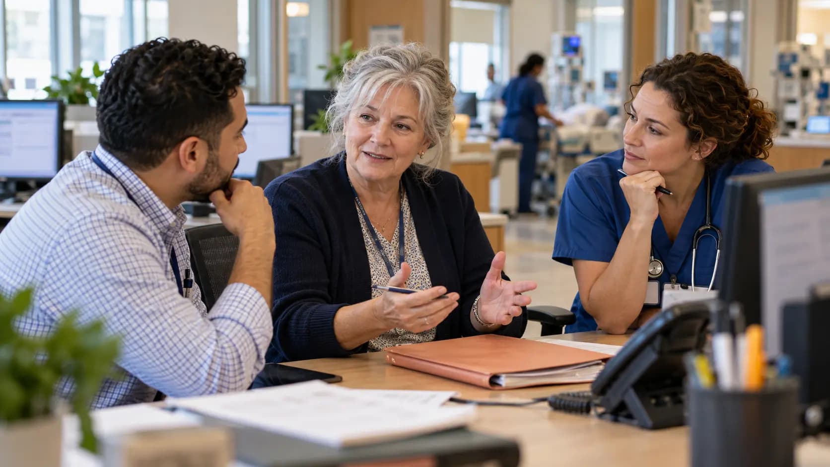 Revenue-cycle specialist and clinician resolving a billing workflow together Revenue-cycle specialist and clinician resolving a billing workflow together