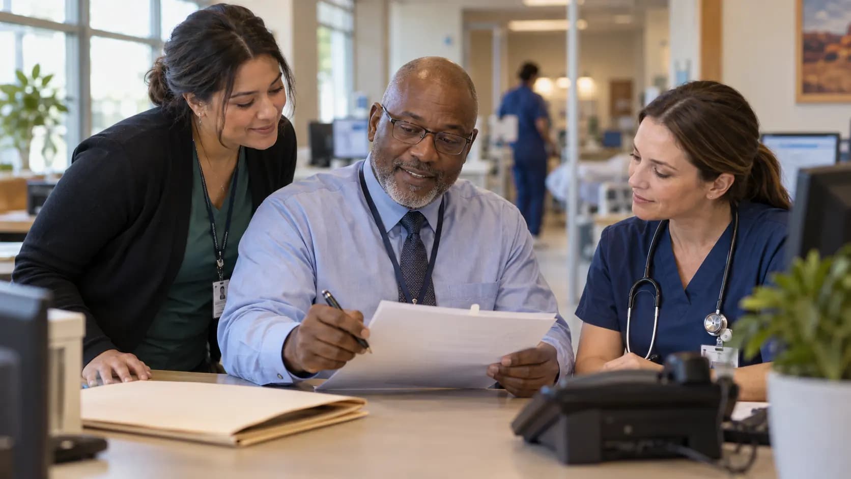 Revenue-cycle specialist and clinician resolving a billing workflow together Revenue-cycle specialist and clinician resolving a billing workflow together