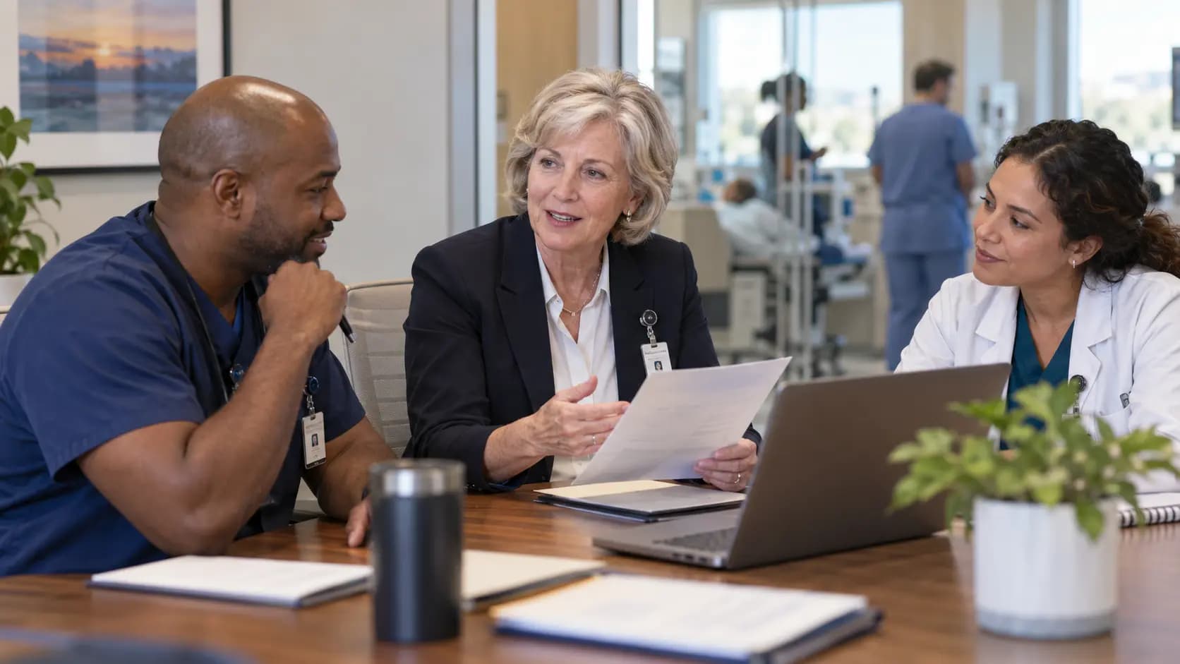 Healthcare finance and operations leaders discussing a practical next step Healthcare finance and operations leaders discussing a practical next step
