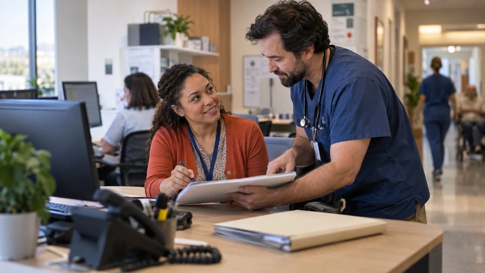 Medical coder and clinician resolving a claim detail together