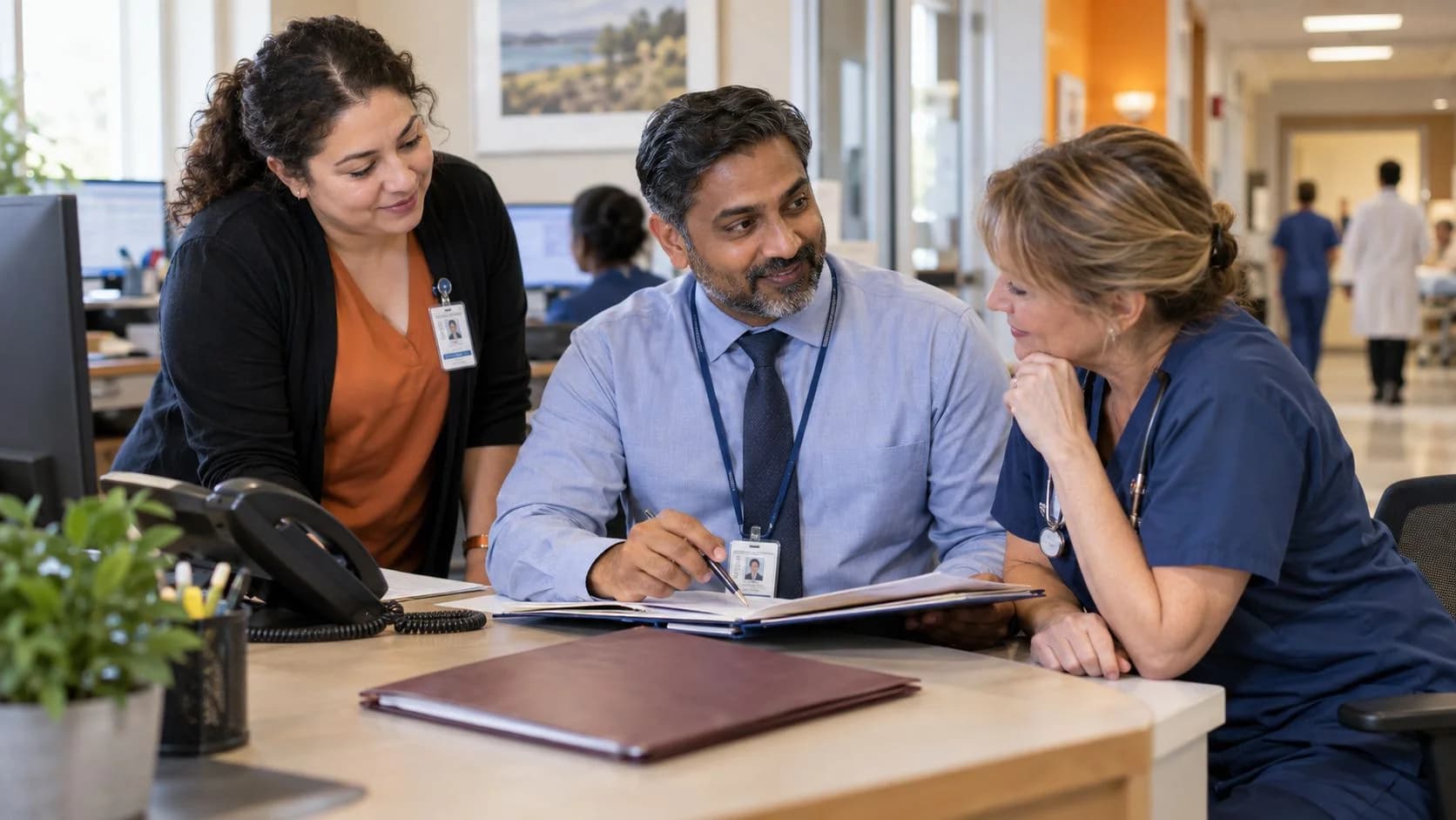 Patient-access coordinator and clinician resolving an authorization issue