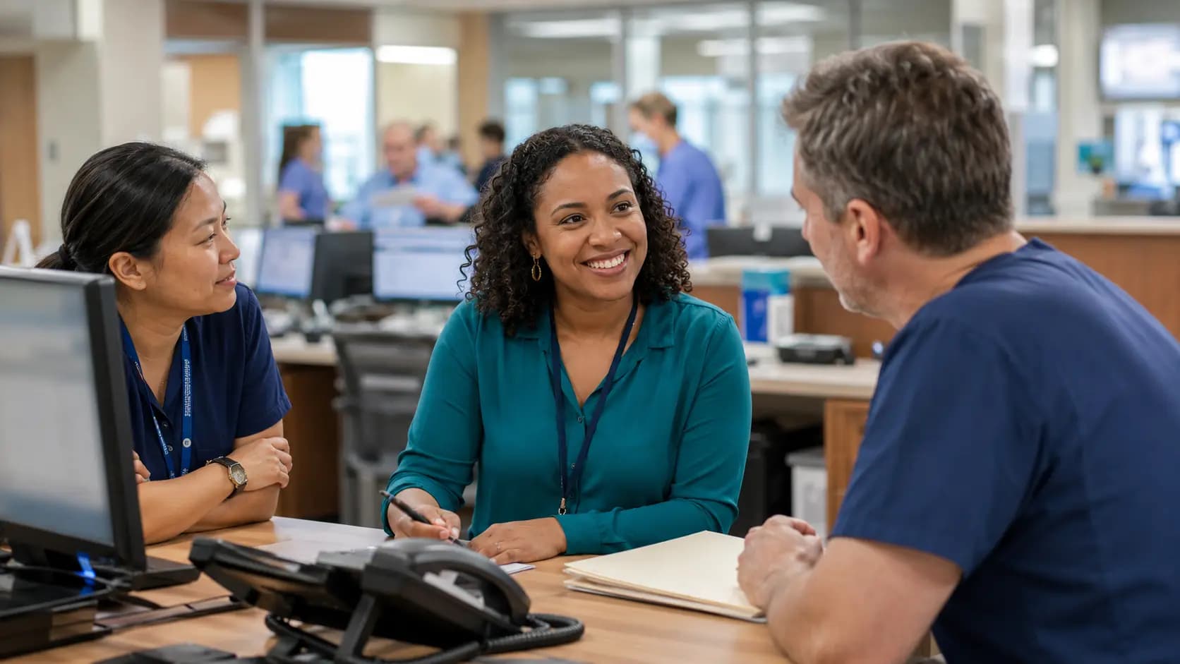 Revenue-cycle specialist and clinician resolving a billing workflow together
