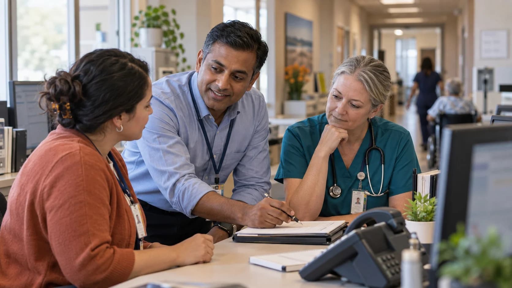 Patient-access coordinator and clinician resolving an authorization issue
