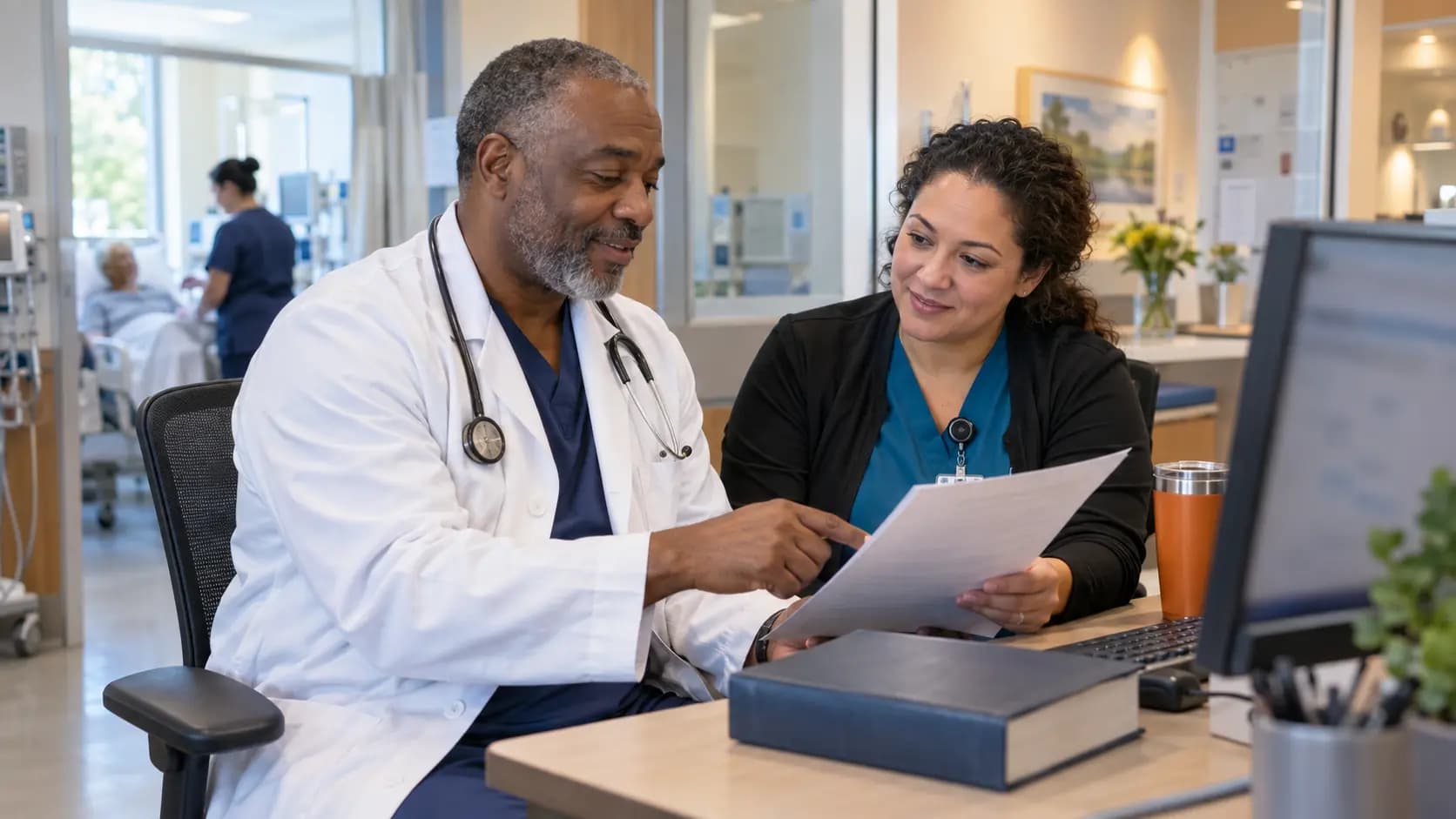 Medical coder and clinician resolving documentation together