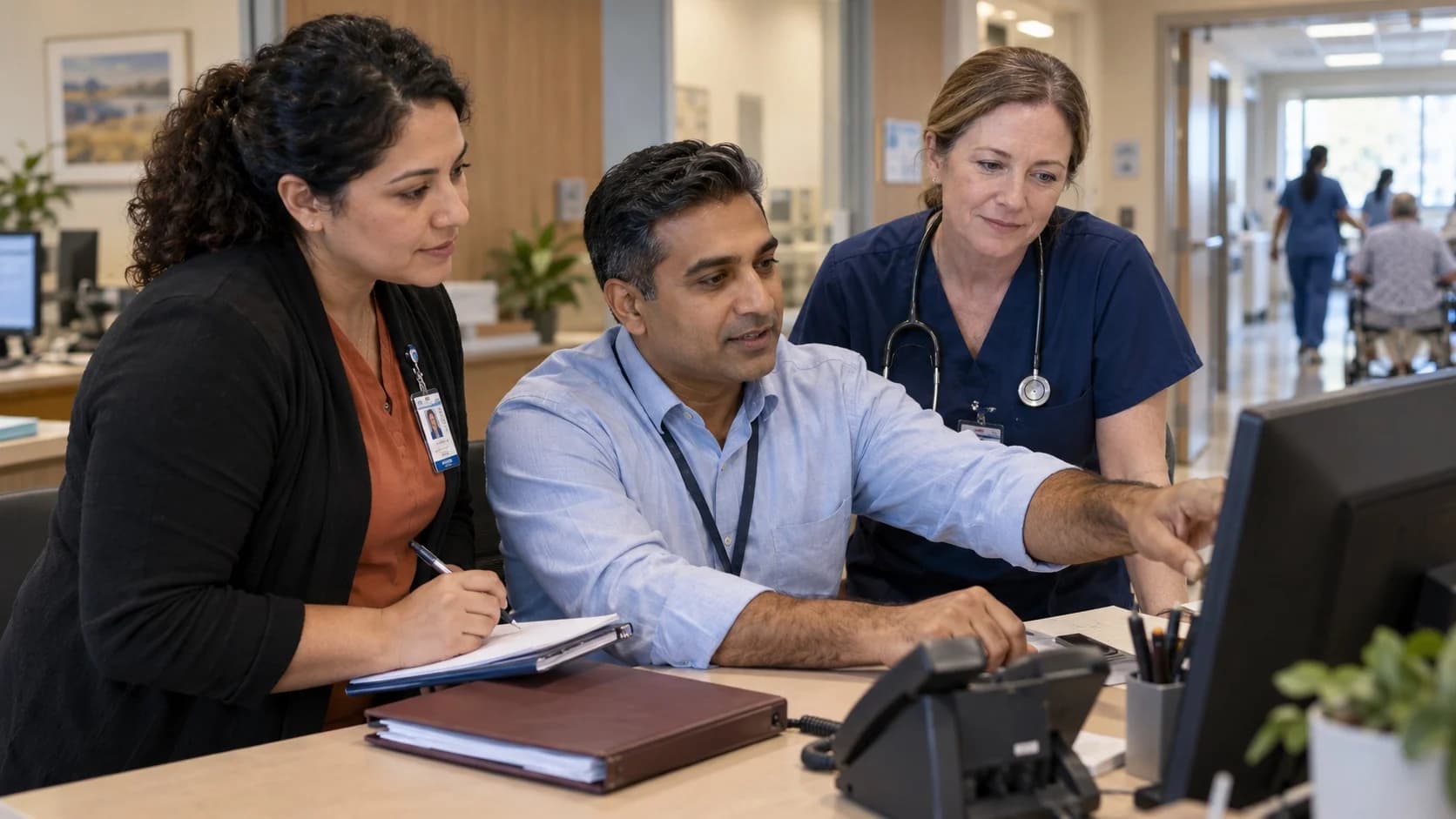 Patient-access coordinator and clinician resolving an authorization issue