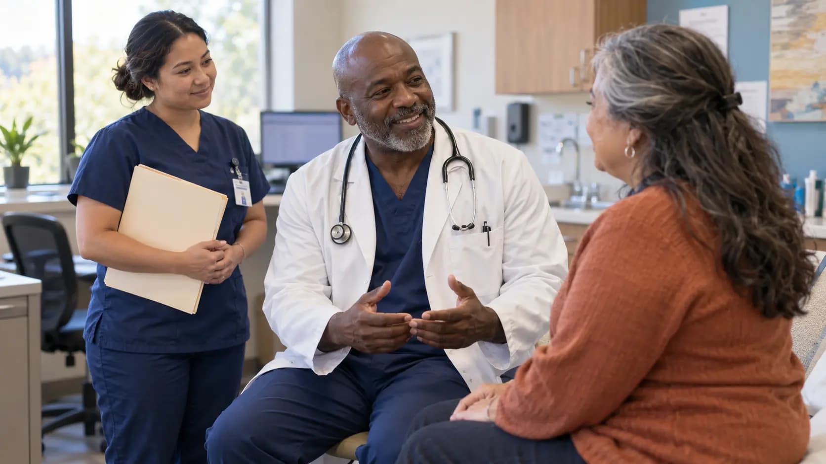 Clinician, patient, and healthcare colleague sharing a warm clinic interaction Clinician, patient, and healthcare colleague sharing a warm clinic interaction