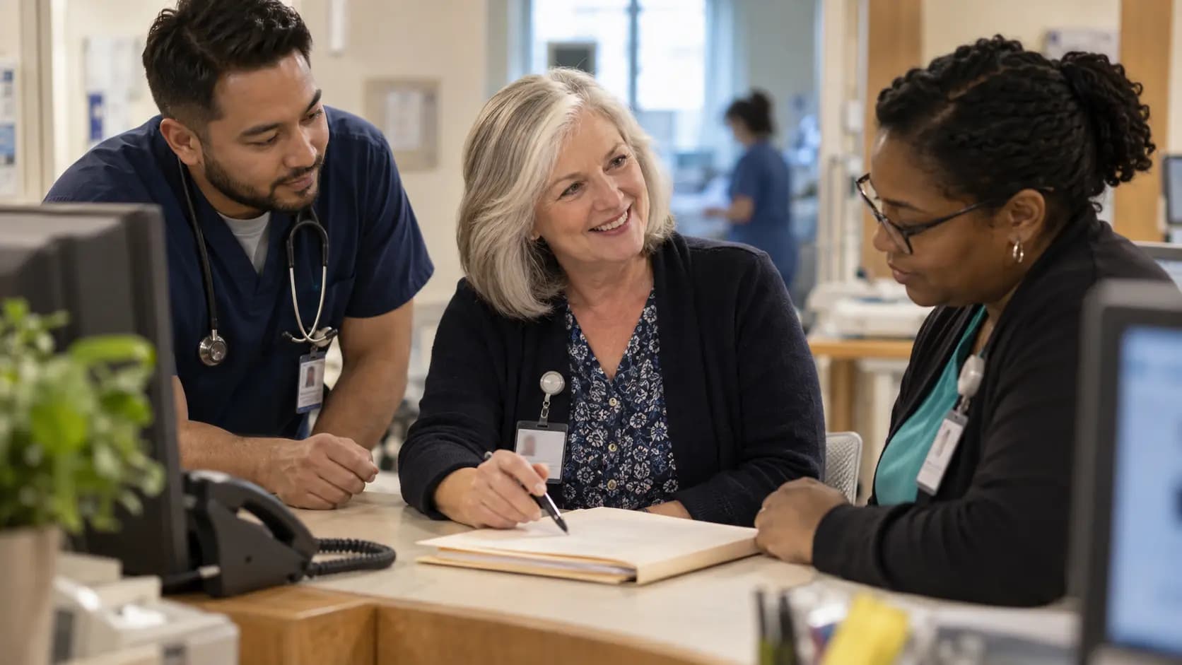 Revenue-cycle specialist and clinician resolving a billing workflow together