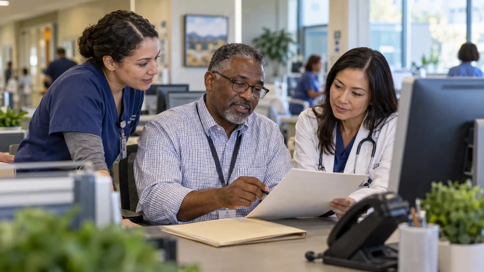 Revenue-cycle specialist and clinician resolving a billing workflow together Revenue-cycle specialist and clinician resolving a billing workflow together