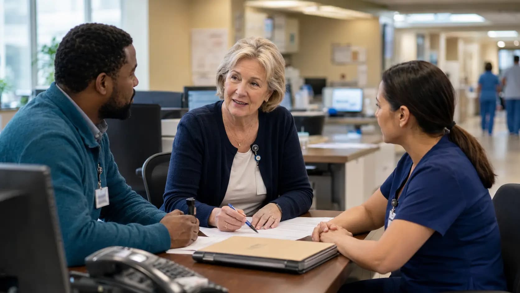 Revenue-cycle specialist and clinician resolving a billing workflow together Revenue-cycle specialist and clinician resolving a billing workflow together