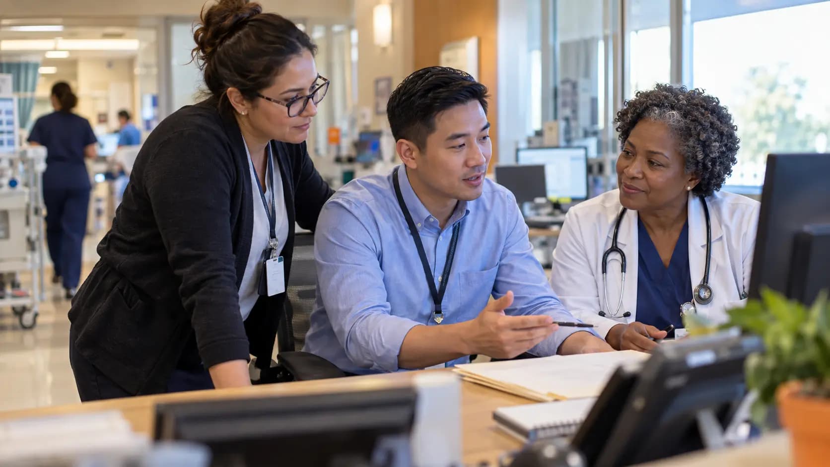 Revenue-cycle specialist and clinician resolving a billing workflow together Revenue-cycle specialist and clinician resolving a billing workflow together