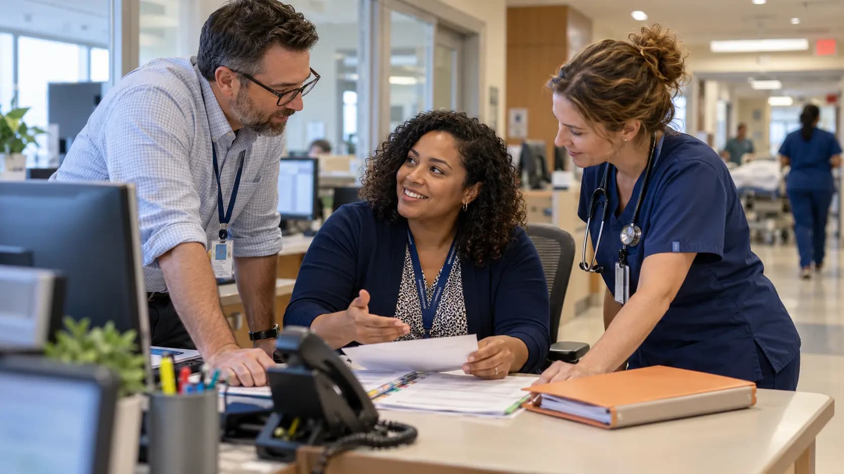 Revenue-cycle specialist and clinician resolving a billing workflow together Revenue-cycle specialist and clinician resolving a billing workflow together