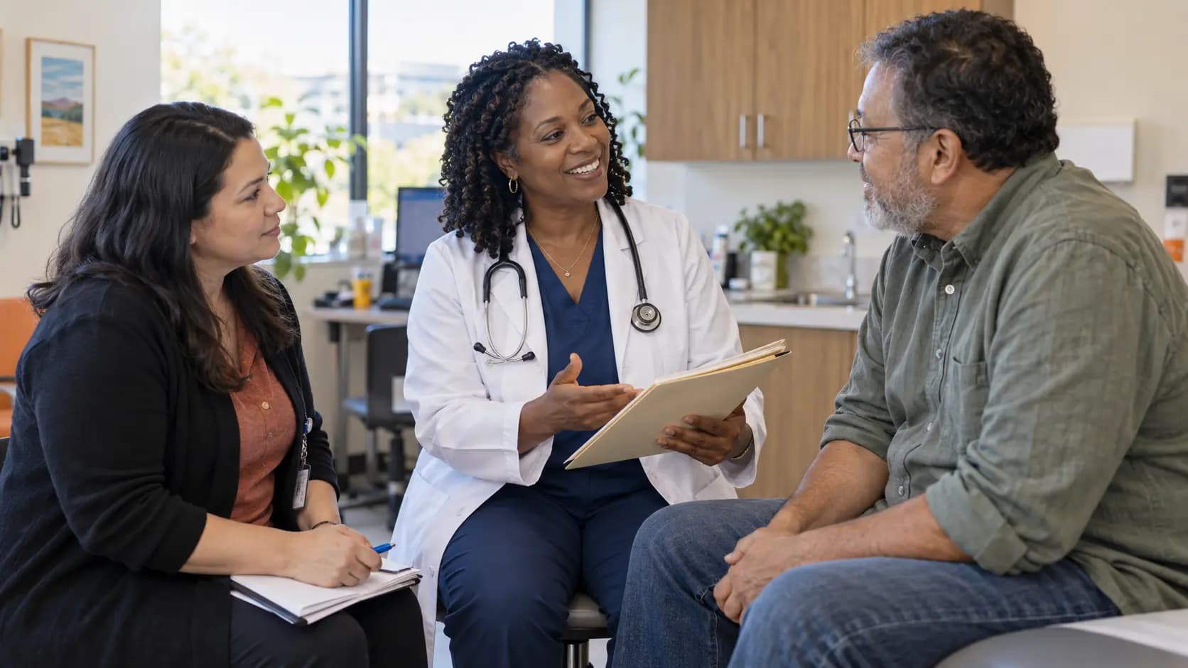 Clinician, patient, and healthcare colleague sharing a warm clinic interaction Clinician, patient, and healthcare colleague sharing a warm clinic interaction