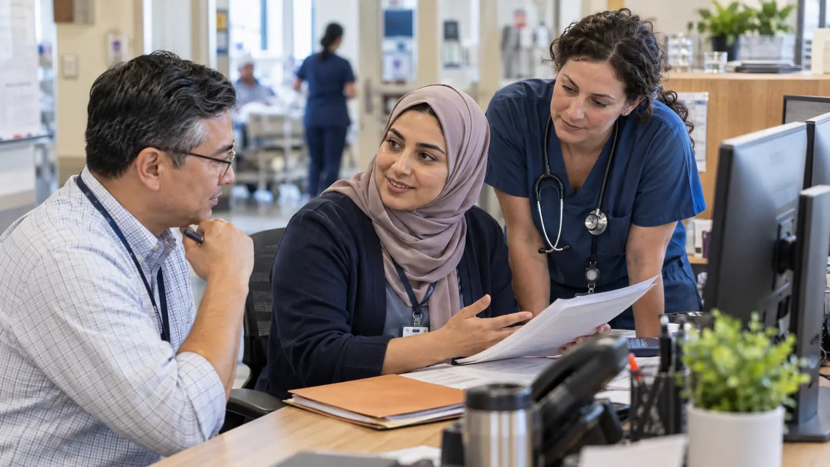 Revenue-cycle specialist and clinician resolving a billing workflow together