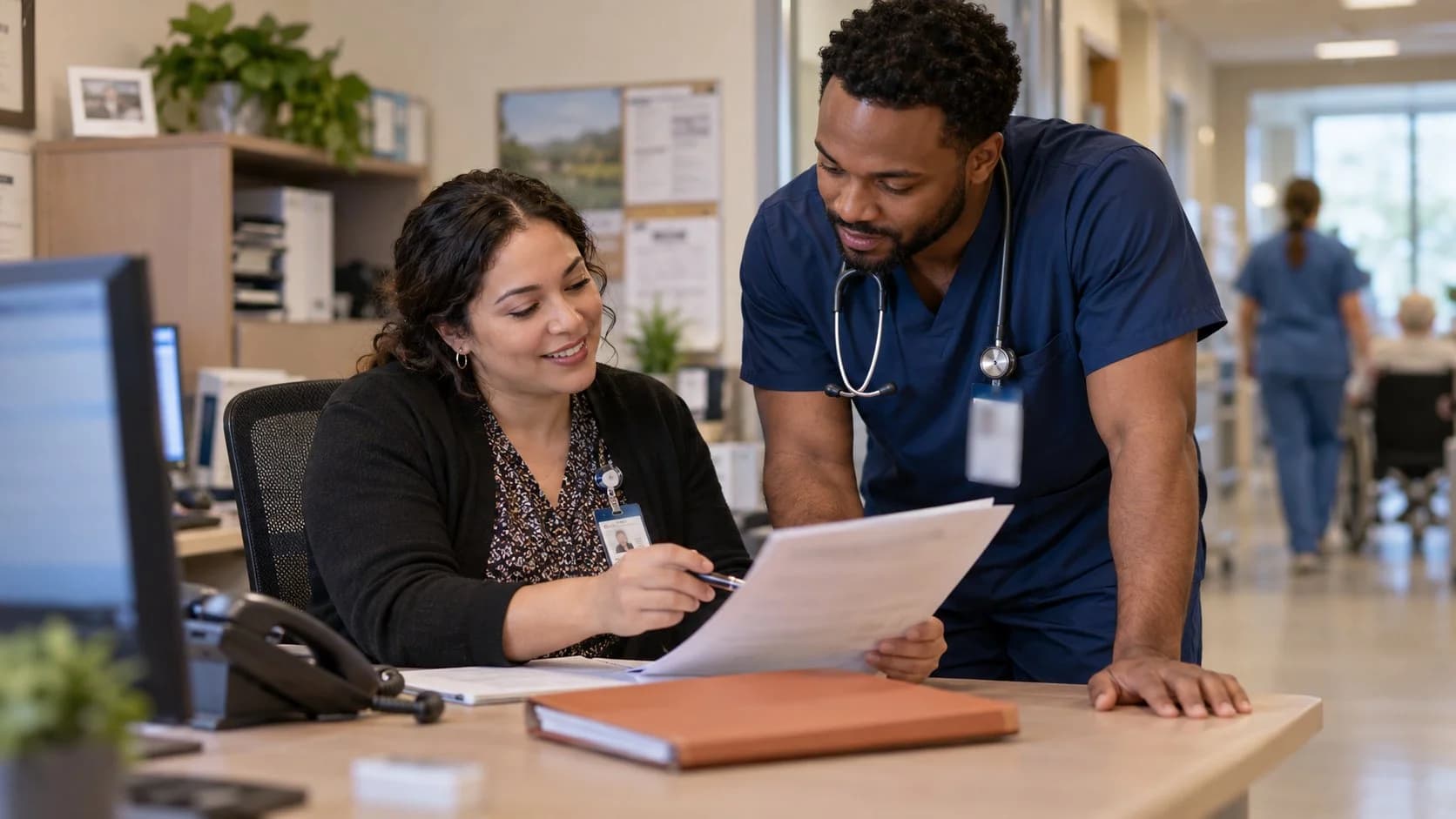 Medical coder and clinician resolving a claim detail together